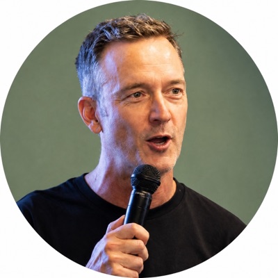 Zac King speaking into a microphone.